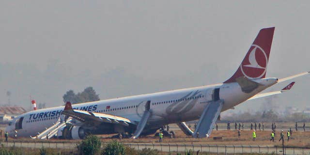 March 4, 2015: A Turkish Airlines jet is seen after it skidded off a slippery runway while landing in dense fog at Tribhuwan International Airport in Kathmandu, Nepal.