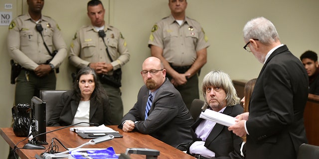 Louise and David Turpin appear in court for their arraignment in Riverside, Calif. They both entered not guilty pleas on all counts.