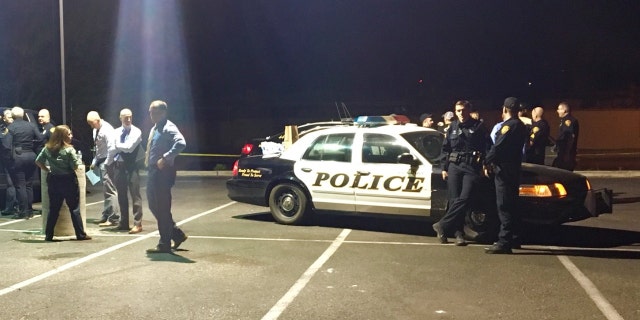The two officers were shot at Friday while responding to a domestic incident. One officer was struck by gunfire which hit his duty belt.