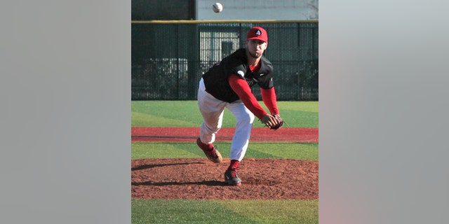 This undated photo shows Brandon Poulson.
