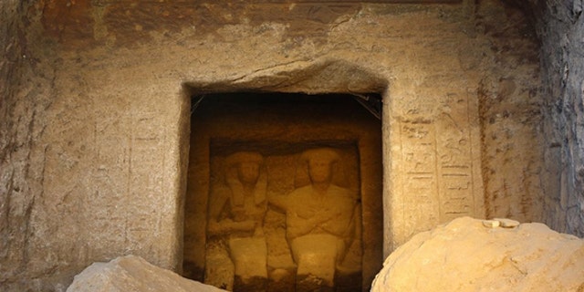 A statue of an ancient Egyptian power couple (a man named Neferkhewe and his wife) from the 18th Dynasty graces a cenotaph at the ancient Egyptian site Gebel el Silsila.