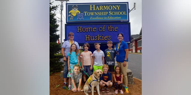 Jane Nagy is teaching language arts and math to students in grades 2-4 this year and her dog Hannon comes to school with her