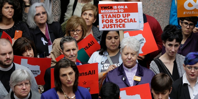 Members of the transgender community and others who oppose Senate Bill 6 protest in Austin, Texas