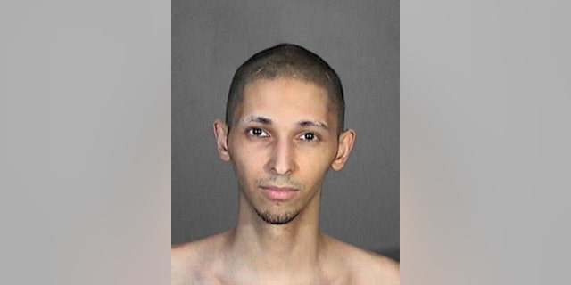 This 2015 booking photo released by the Glendale, Calif., Police Department shows Tyler Raj Barriss.