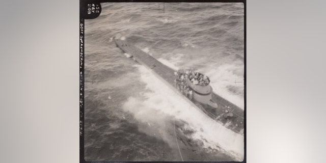 An aerial picture showing the dramatic capture of German submarine U-571 during World War II (Henry Aldridge & Son)