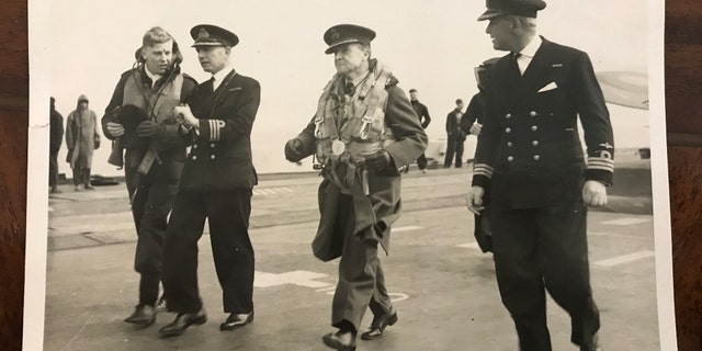 An image of Group Captain Whittle (second from the right, in flying gear) is among the extensive archive of artifacts up for auction (Henry Aldridge & Son)