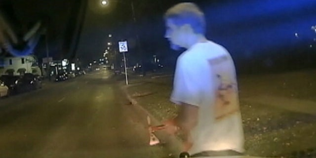 Dec. 13, 2015: This image take from dashcam video shows University of North Texas student Ryan McMillan seconds before he was shot and killed by a campus police officer in Denton, Texas. (Texas Department of Public Safety)