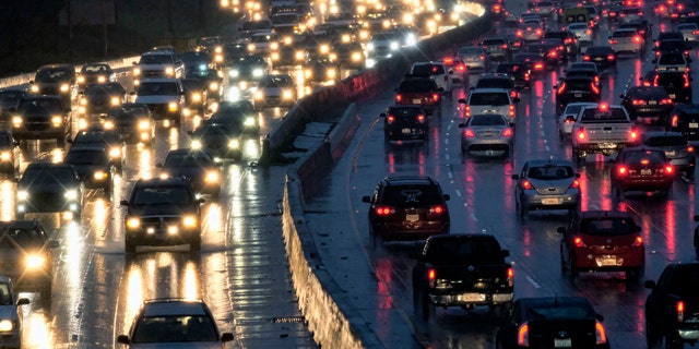 Early morning rush hour traffic crawls along the Hollywood Freeway toward downtown Los Angeles on Jan. 12, 2017.