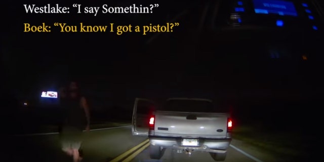 The moment Jason Boek approached Robert Westlake's car.