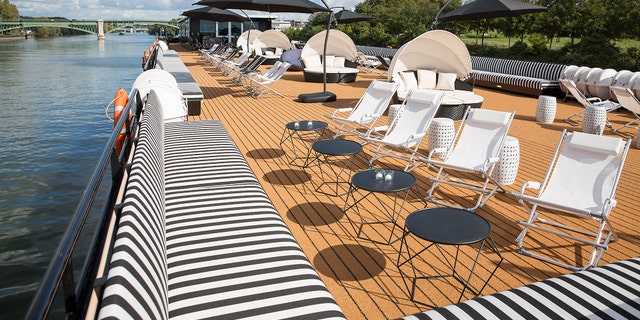 An upper deck lounge venue allows for sunbathing by day...