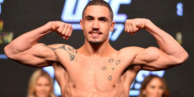 LAS VEGAS, NV - APRIL 20: Robert Whittaker of New Zealand steps on the scale during the UFC 197 weigh-in at the MGM Grand Garden Arena on April 20, 2016 in Las Vegas, Nevada. (Photo by Josh Hedges/Zuffa LLC/Zuffa LLC via Getty Images)
