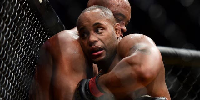 LAS VEGAS, NV - JULY 09: (R-L) Daniel Cormier wrestles with Anderson Silva of Brazil in their light heavyweight bout during the UFC 200 event on July 9, 2016 at T-Mobile Arena in Las Vegas, Nevada. (Photo by Harry How/Zuffa LLC/Zuffa LLC via Getty Images)