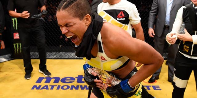 LAS VEGAS, NV - JULY 09: Amanda Nunes of Brazil reacts to her victory over Miesha Tate in their UFC women's bantamweight championship bout during the UFC 200 event on July 9, 2016 at T-Mobile Arena in Las Vegas, Nevada. (Photo by Josh Hedges/Zuffa LLC/Zuffa LLC via Getty Images)