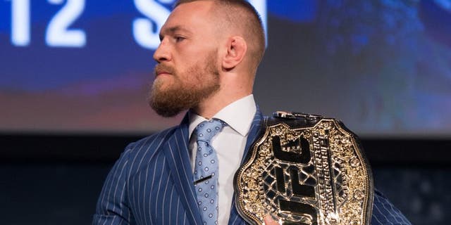 NEW YORK, NY - SEPTEMBER 27: UFC featherweight champion Conor McGregor stares at UFC lightweight champion Eddie Alvarez during the UFC 205 press event at Madison Square Garden on September 27, 2016 in New York City. (Photo by Brandon Magnus/Zuffa LLC/Zuffa LLC via Getty Images)