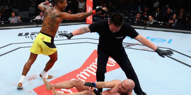 SAO PAULO, BRAZIL - NOVEMBER 19: Johnny Eduardo of Brazil celebrates victory against Many Gamburyan of Armenia after their bantamweight bout at the UFC Fight Night Bader v Minotouro at Ibirapuera Gymnasium on November 19, 2016 in Sao Paulo, Brazil. (Photo by Buda Mendes/Zuffa LLC/Zuffa LLC via Getty Images)
