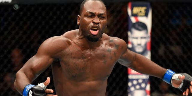 HIDALGO, TX - SEPTEMBER 17: Derek Brunson celebrates his knockout victory over Uriah Hall of Jamaica in their middleweight bout during the UFC Fight Night event at State Farm Arena on September 17, 2016 in Hidalgo, Texas. (Photo by Josh Hedges/Zuffa LLC/Zuffa LLC via Getty Images)