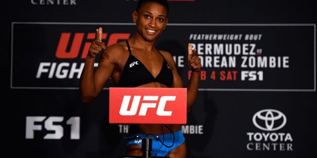 HOUSTON, TEXAS - FEBRUARY 03: Angela Hill poses on the scale during the UFC Fight Night weigh-in at the Sheraton North Houston at George Bush Intercontinental on February 3, 2017 in Houston, Texas. (Photo by Jeff Bottari/Zuffa LLC/Zuffa LLC via Getty Images)