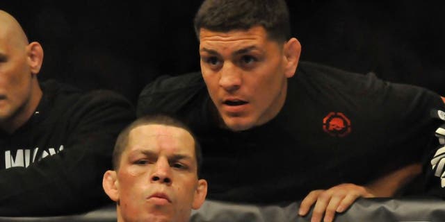 EAST RUTHERFORD, NEW JERSEY - MAY 5, 2012: Nate Diaz receives last second advice from his brother Nick Diaz in his corner before a lightweight bout at Izod Center on May 5, 2012 in East Rutherford, New Jersey. (Photo by David Dermer/Diamond Images/Getty Images)