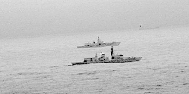 The Royal Navy's HMS St Albans escorts a Russian warship through the North Sea and areas of U.K. interest on Christmas Day, Monday, Dec. 25, 2017.