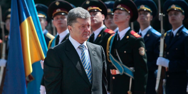 June 6, 2014: Ukrainian President Petro Poroshenko reviews an honor guard after the inauguration ceremony in Sophia Square in Kiev, Ukraine.
