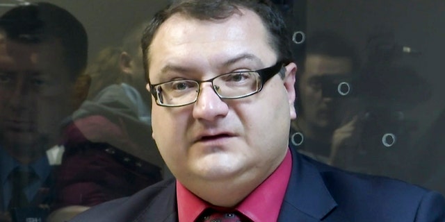 In this grab taken from Associated Press Television footage on Tuesday, Nov. 3, 2015, Yuri Grabovsky speaks during a trial hearing at the Holosiivskyi District Court in Kiev, Ukraine.