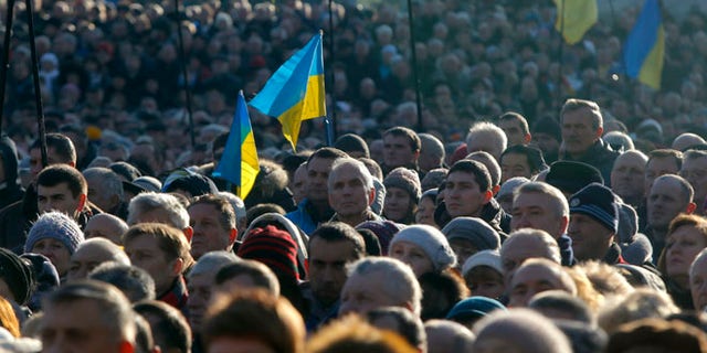 Dec. 22, 2013: Pro-European Union activists gather in Independence Square in Kiev, Ukraine. Ukraine has been stricken with mass protests for over a month. Protesters are demanding the resignation of President Viktor Yanukovych over his decision to ditch a pact with the European Union in favor of closer ties with Russia.