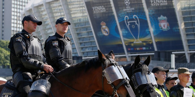 Members of the Ukrainian National Police take part in a security exercise during preparations for the Champions League final between Real Madrid and Liverpool outside the NSC Olympic stadium in Kiev, Ukraine May 15, 2018.