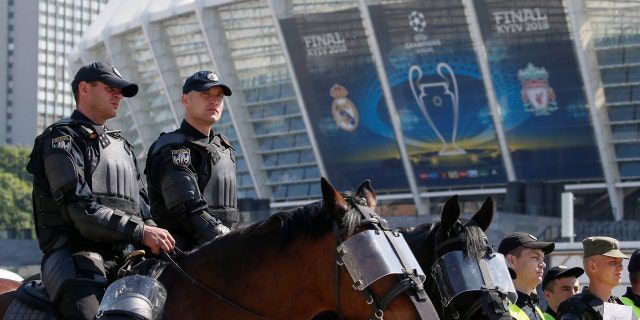 Members of the Ukrainian National Police take part in a security exercise during preparations for the Champions League final between Real Madrid and Liverpool outside the NSC Olympic stadium in Kiev, Ukraine May 15, 2018.