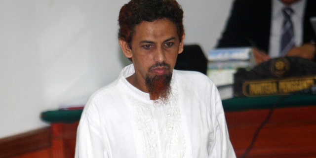 June 21, 2012: Indonesian militant Umar Patek enters the courtroom for his hearing at West Jakarta district court in Jakarta, Indonesia.