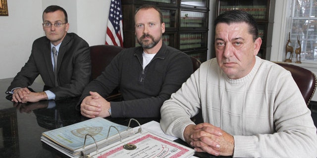 Attorney Thomas Roughneen,with clients, retired public university police officers Robert Dunsmuir and John Kotchkowski. (Jerry McCrea | For NJ Advance Media)