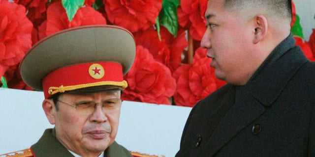 Jang Song-thaek, (l.), may not have actually been killed by a pack of wild dogs on orders from his nephew. He may have been killed with an anti-aircraft gun and incinerated with a flamethrower.