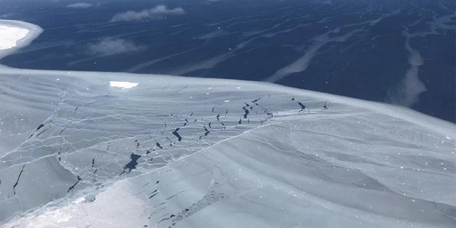 Looking out from the sea ice to iceberg A68, around November 2017, just months after the berg calved from Antarctica’s Larsen C Ice Shelf in July. (Credit: NASA)