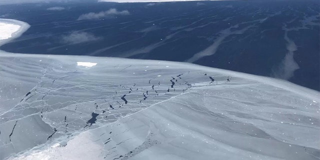 Looking out from the sea ice to iceberg A68, around November 2017, just months after the berg calved from Antarctica’s Larsen C Ice Shelf in July. (Credit: NASA)