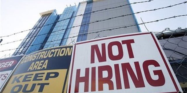 Thursday: A sign turning away potential job-seekers outside a construction site in New Orleans. Employers added the most jobs in five months in October, but the unemployment rate remained at 9.6 percent and the construction industry posted no notable gains.