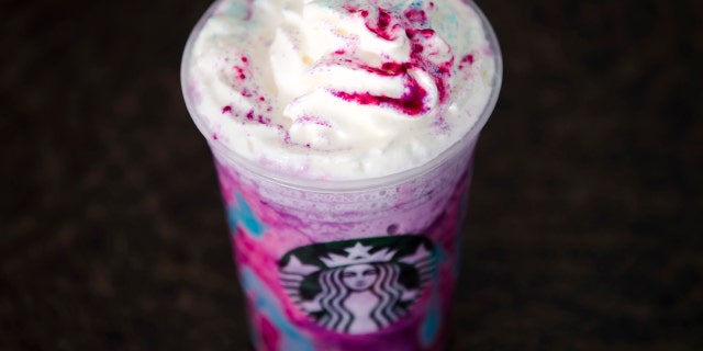In this Thursday, April 20, 2017, file photo, a Starbucks Unicorn Frappuccino sits on display, in Philadelphia.