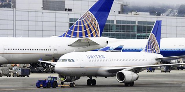 United has fired an employee who deployed an emergency slide.