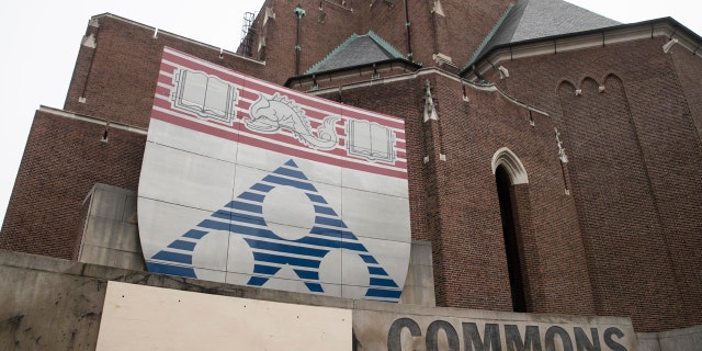 Steve Wynn's name is boarded over at the University of Pennsylvania in Philadelphia, Thursday, Feb. 1, 2018. The university has announced plans to distance itself from casino mogul Wynn and comedian Bill Cosby in the wake of sexual misconduct allegations against both men. (AP Photo/Matt Rourke)