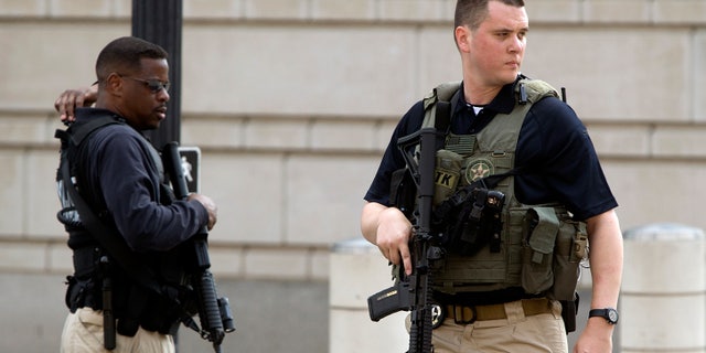 June 28, 2014: U.S. Federal Marshals secure the streets outside the U.S. federal court in Washington