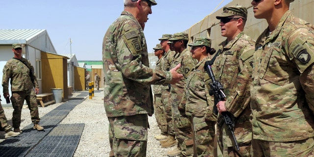 U.S. Army General John Nicholson, commander of Resolute Support forces and U.S. forces in Afghanistan, talks to U.S. soldiers during a transfer of authority ceremony at Shorab camp, in Helmand province, Afghanistan April 29, 2017. Picture taken April 29, 2017.