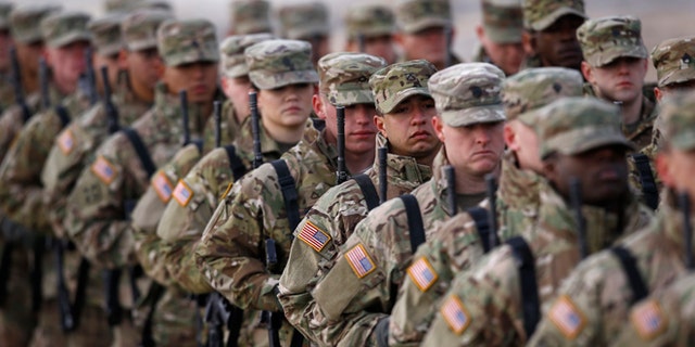 U.S. soldiers attend the inauguration ceremony of bilateral military training between U.S. and Polish troops in Zagan, Poland, January 30, 2017. REUTERS/Kacper Pempel - RTSY23N