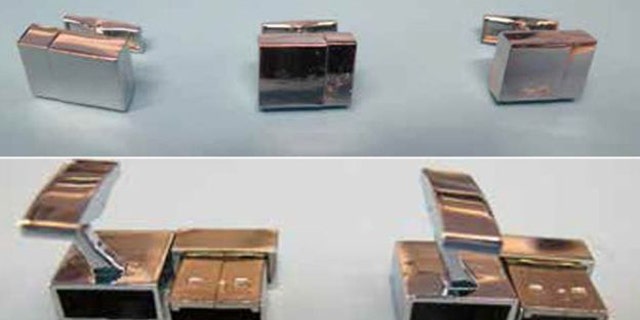Some of the 60 USB cufflinks seized by police.