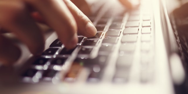 Businessman using laptop computer