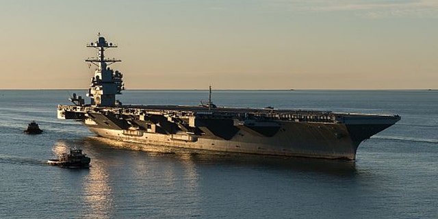 The aircraft carrier Pre-Commissioning Unit (PCU) Gerald R. Ford (CVN 78) pulls into Naval Station Norfolk for the first time on April 14, 2017. The first-of-class ship - the first new U.S. aircraft carrier design in 40 years - spent several days conducting builder's sea trails, a comprehensive test of many of the ship's key systems and technologies. (U.S. Navy photo by Matt Hildreth courtesy of Huntington Ingalls Industries/Released)