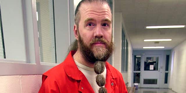 June 30, 2003: Dan Lafferty poses for a photograph, at Utah State Prison in Draper, Utah.
