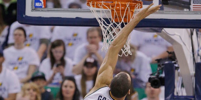 Utah Jazz center Rudy Gobert (27) goes for a rebound against the Los Angeles Clippers.