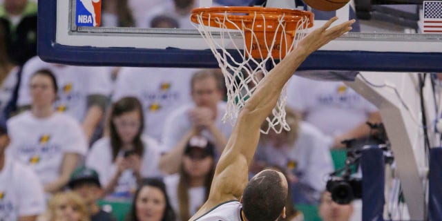 Utah Jazz center Rudy Gobert (27) goes for a rebound against the Los Angeles Clippers.
