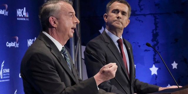Sept. 19, 2017: Virginia gubernatorial candidates Republican Ed Gillespie, left, and Democratic Lt. Gov. Ralph Northam debate in McLean, Va. Hillary Clinton is planning to fundraise for Northam in the final stretch.