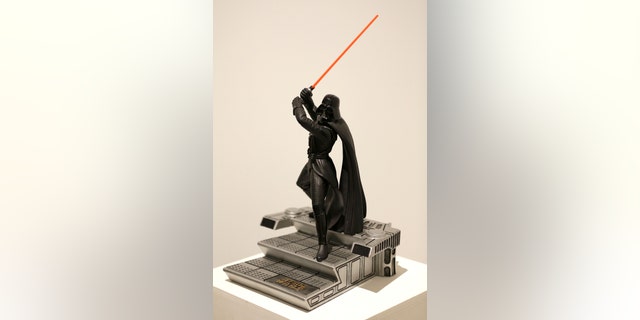 Dec. 2, 2015. A statue of Darth Vader from the "Star Wars" movie series displayed during a press preview at Sotheby's in New York.