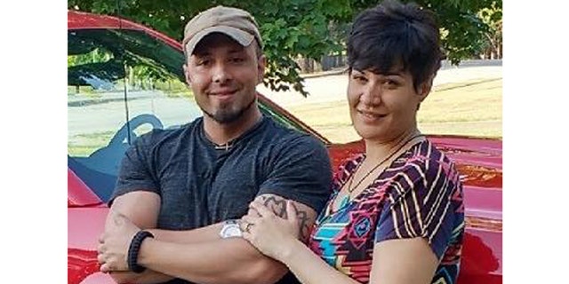 Valerie Tieman, right, is seen with her husband in photo taken in July. (Maine State Police)