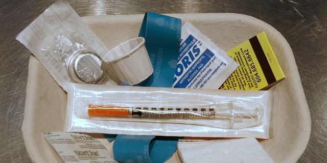 A small kit of supplies containing syringes, bandaids and antiseptic pads waits to be used by a drug addict inside a safe injection site on Vancouver, British Columbia's eastside August 23, 2006. Known as Insite the facility opened three years ago and operates legally after the federal and provincial governments gave their blessing. Inside, addicts can shoot up their own heroin or cocaine under the supervision of a nurse. The Health Canada exemption runs out Sept. 12 and Prime Minister Stephen Harper has said he's 